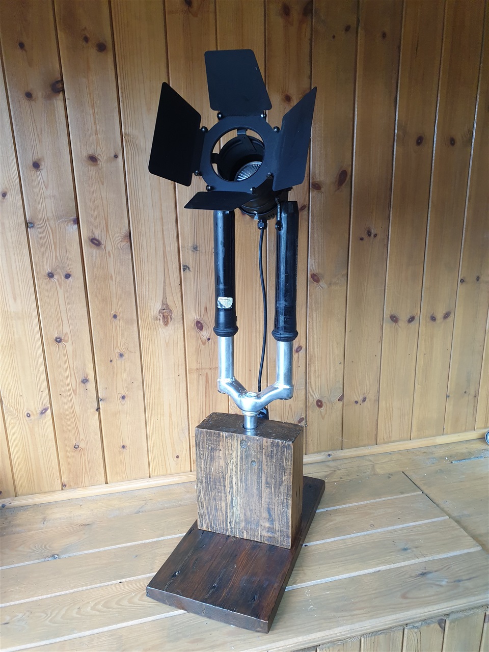 This is a BIG lamp..mountain bike forks with stage sporlamp in a big  wooden base